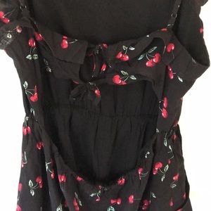 Love + Harmony Pants - Black and red cherry printer romper. Love + Harmony Pants - Black and red cherry printer romper.